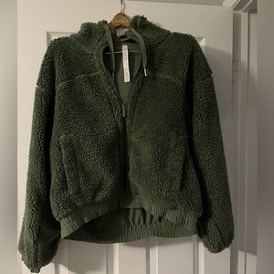 Lululemon Green zip up fleece hooded jacket. Womens size 12. Used